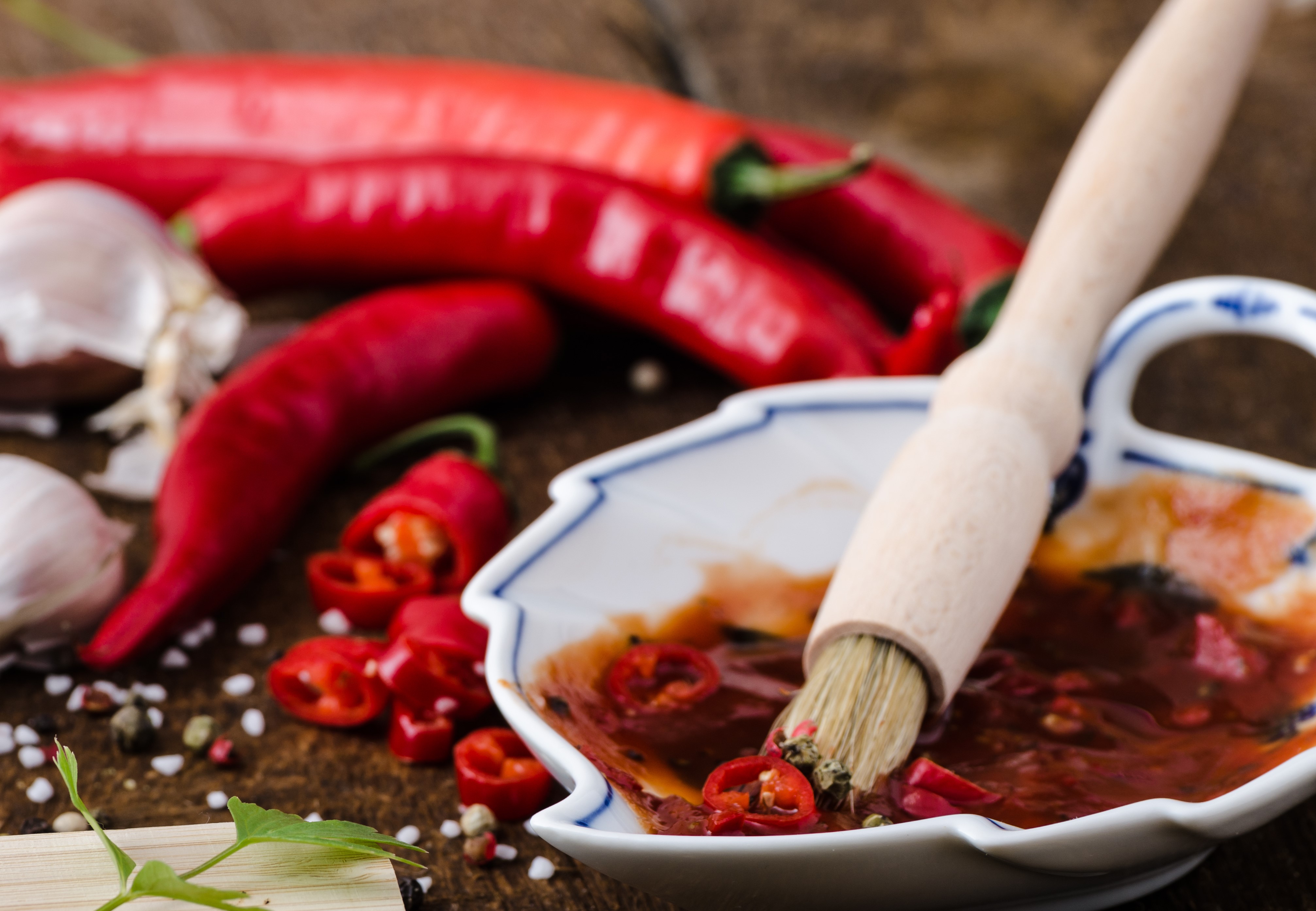 Carribbean Marinade.jpg Marinade in saucer with brush, chillies and garlic on the side