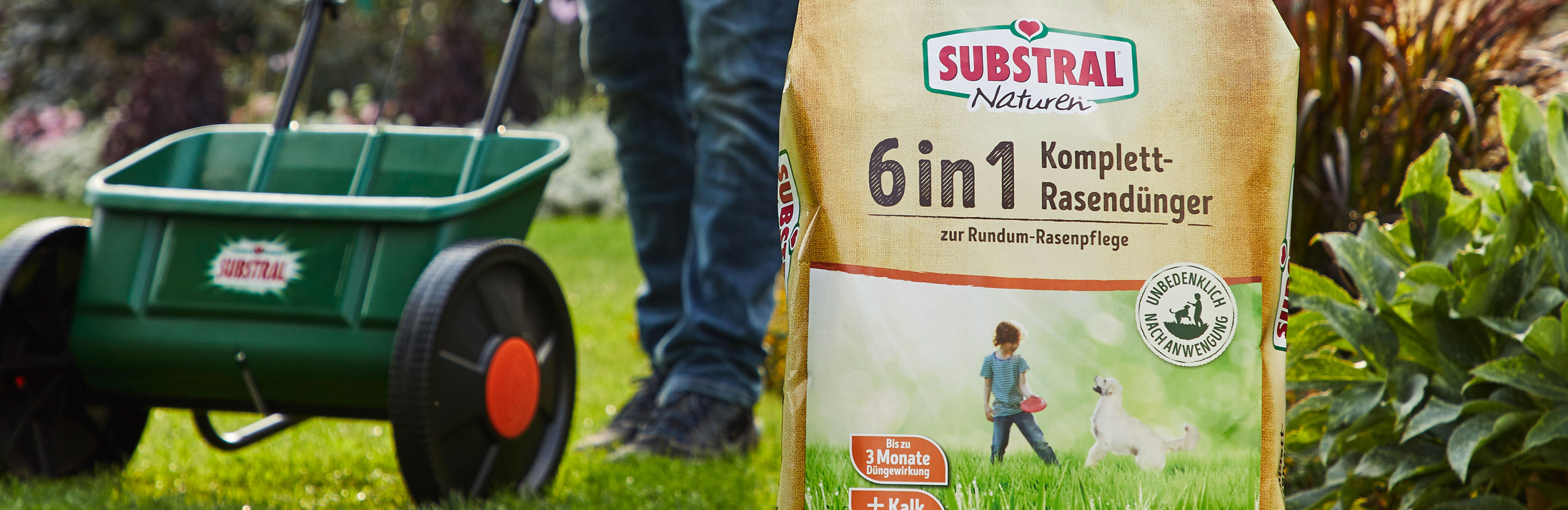 Rasen mit Susbtral Naturen im Frühjahr düngen