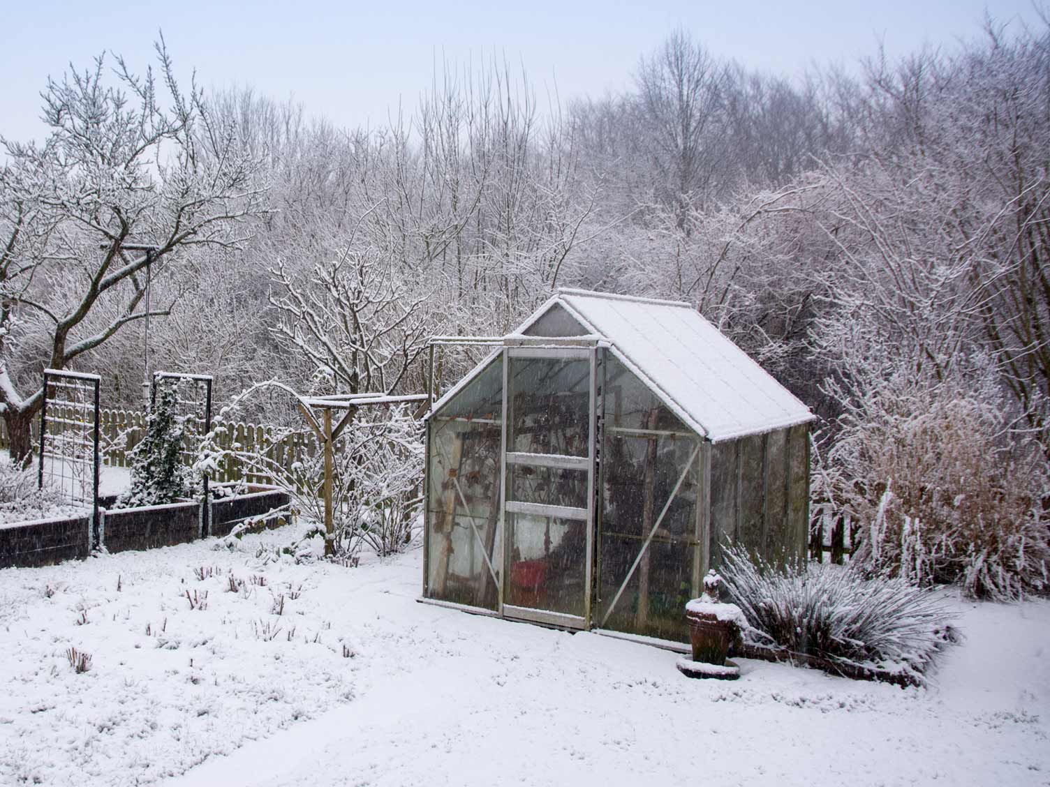 greenhouse-during-snow.jpg Greenhouse during snow in winter