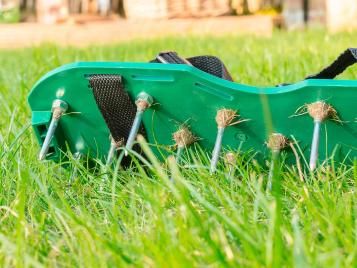 Lawn aerating shoes with spikes