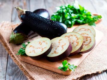 Freshly prepared aubergines (eggplants)