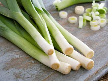 Fresh leeks being prepared