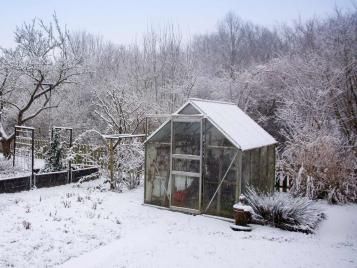 Greenhouse during snow in winter